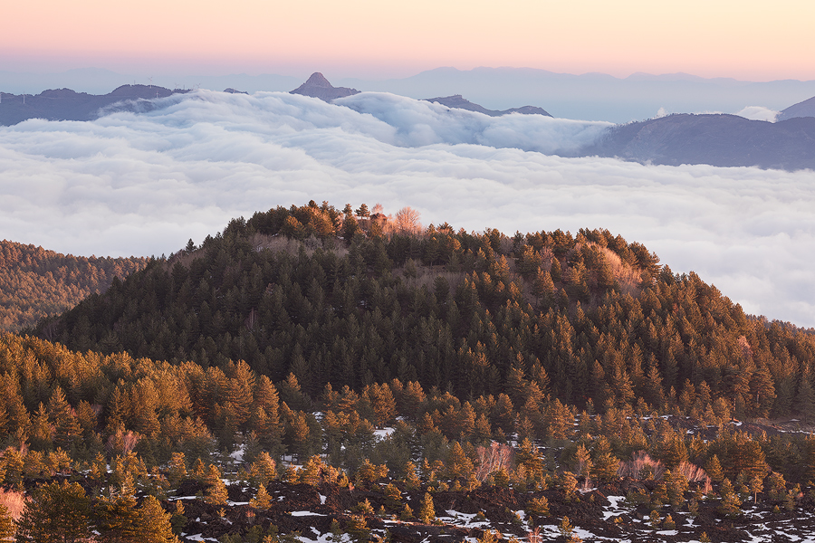 And behind a sea of clouds